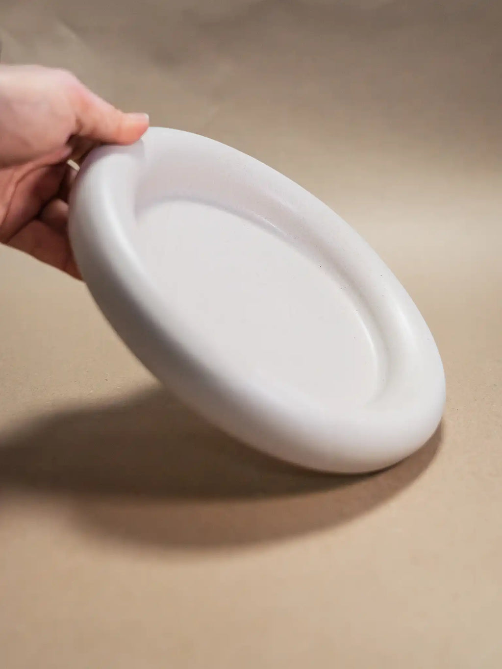 Donut schaal mat taupe