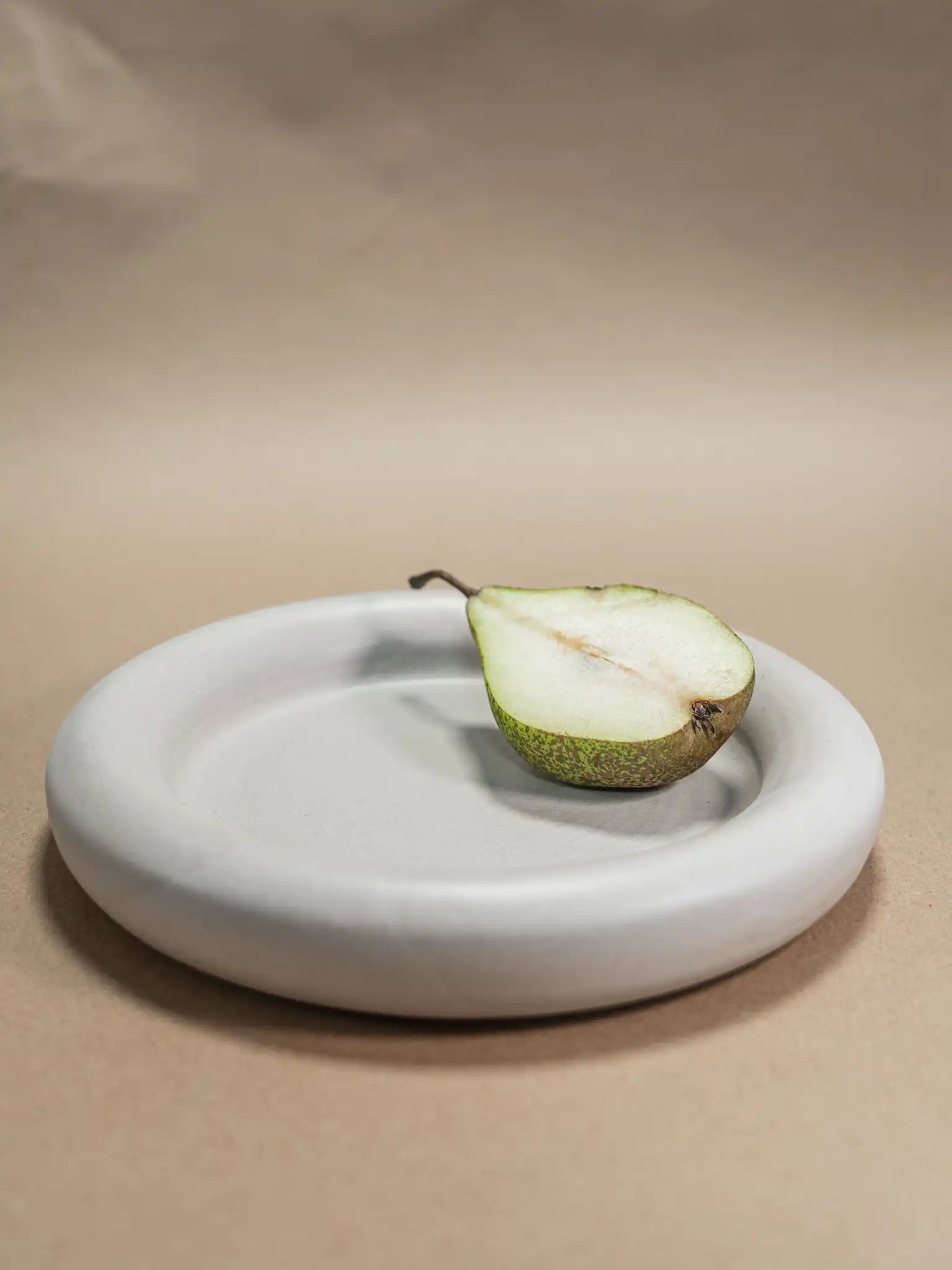 Donut schaal mat taupe